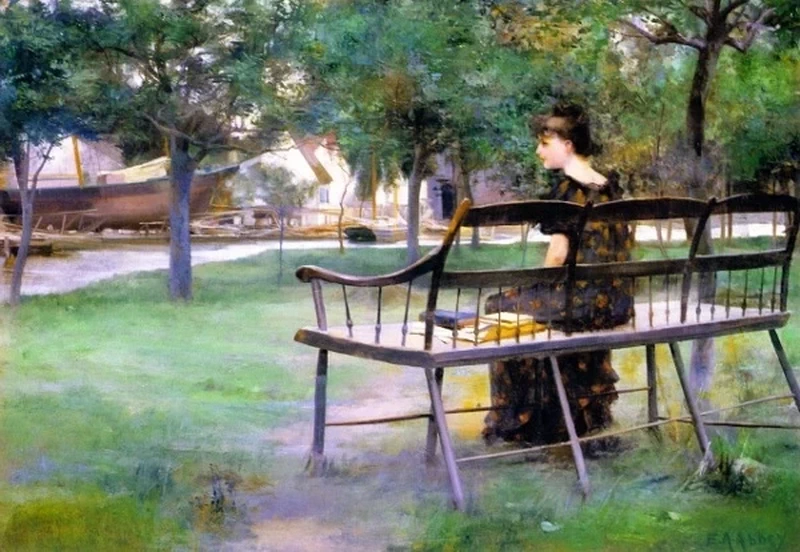 Donna su una panchina del parco